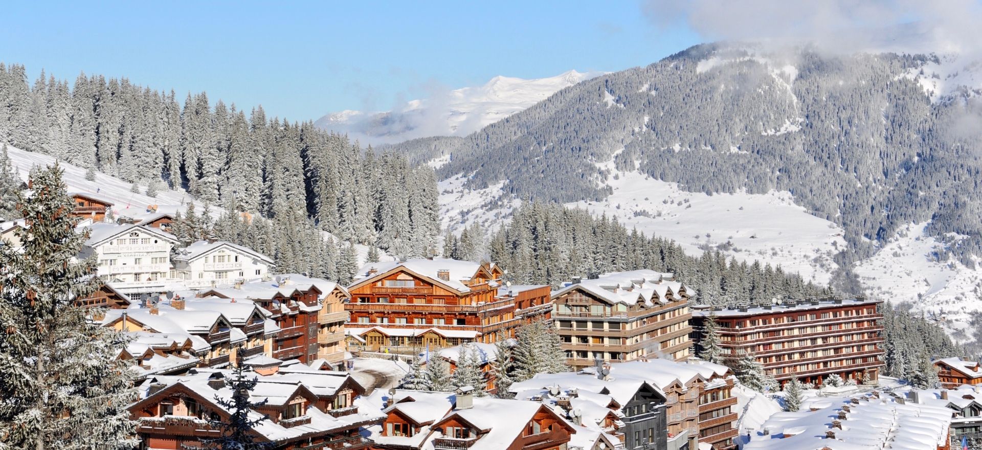 A snowy winter scene of Courchevel, France, in the French Alps, ideal for a Christmas getaway by private jet charter.